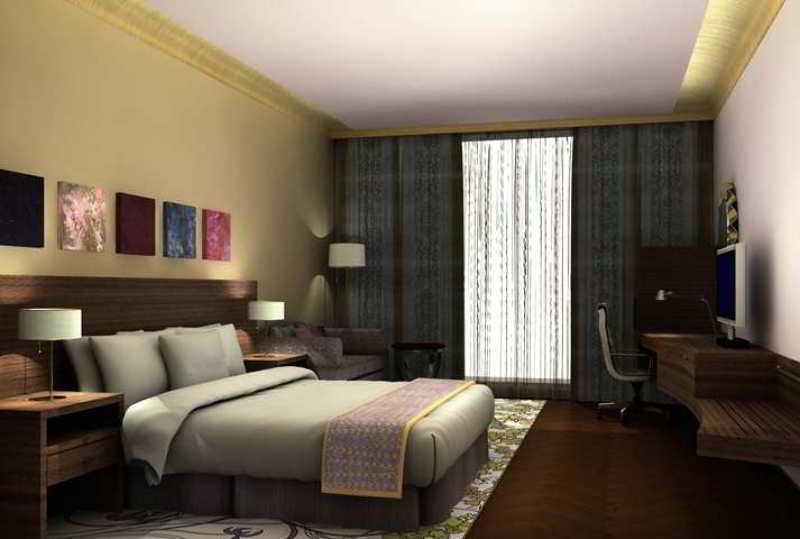 Hilton Jaipur Hotel Kültér fotó A typical hotel room